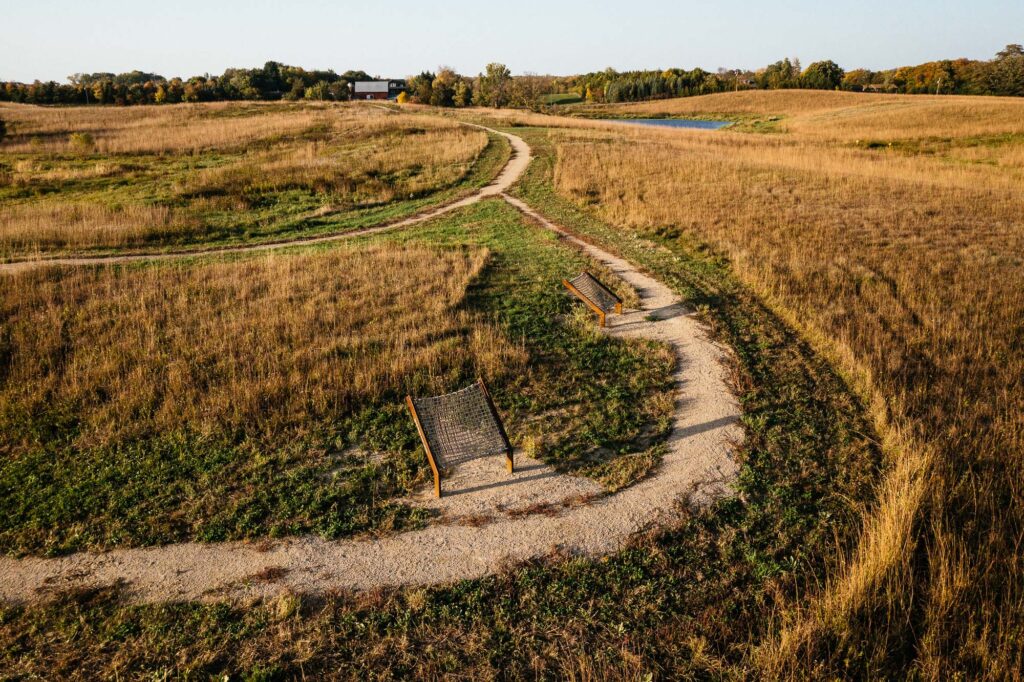 Trail and loungers at the Six Mile Marsh Prairie